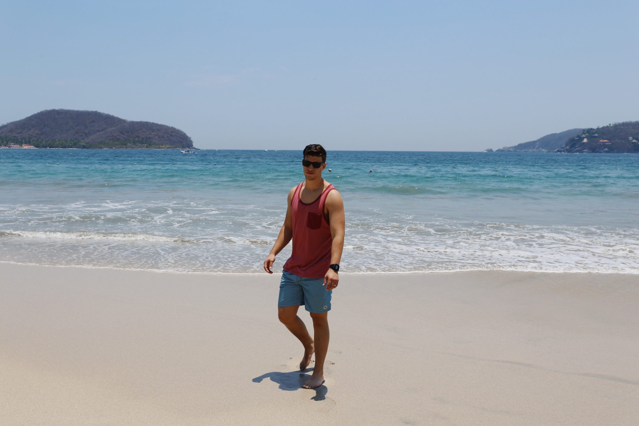 man at the beach in Zihuatanejo, Mexico