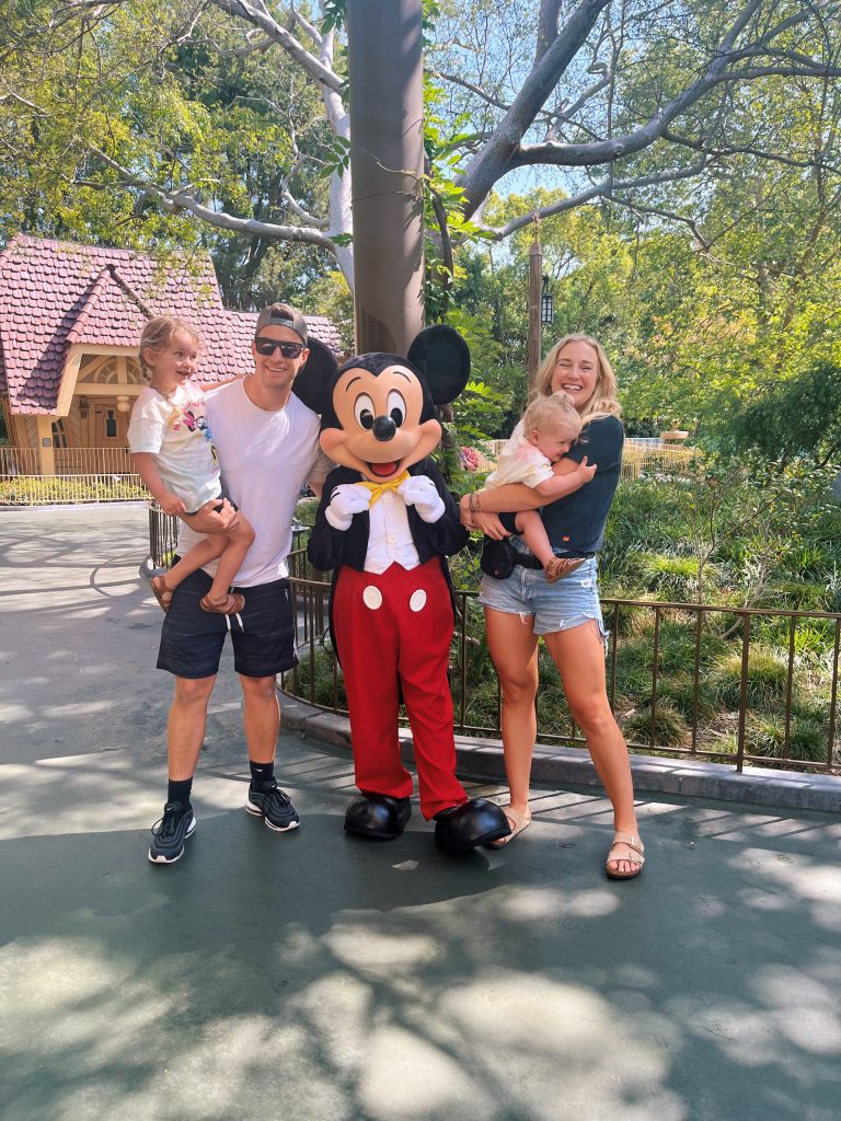 Ruth Nuss and her family taking a photo with Minie and sharing Disneyland tips for toddlers