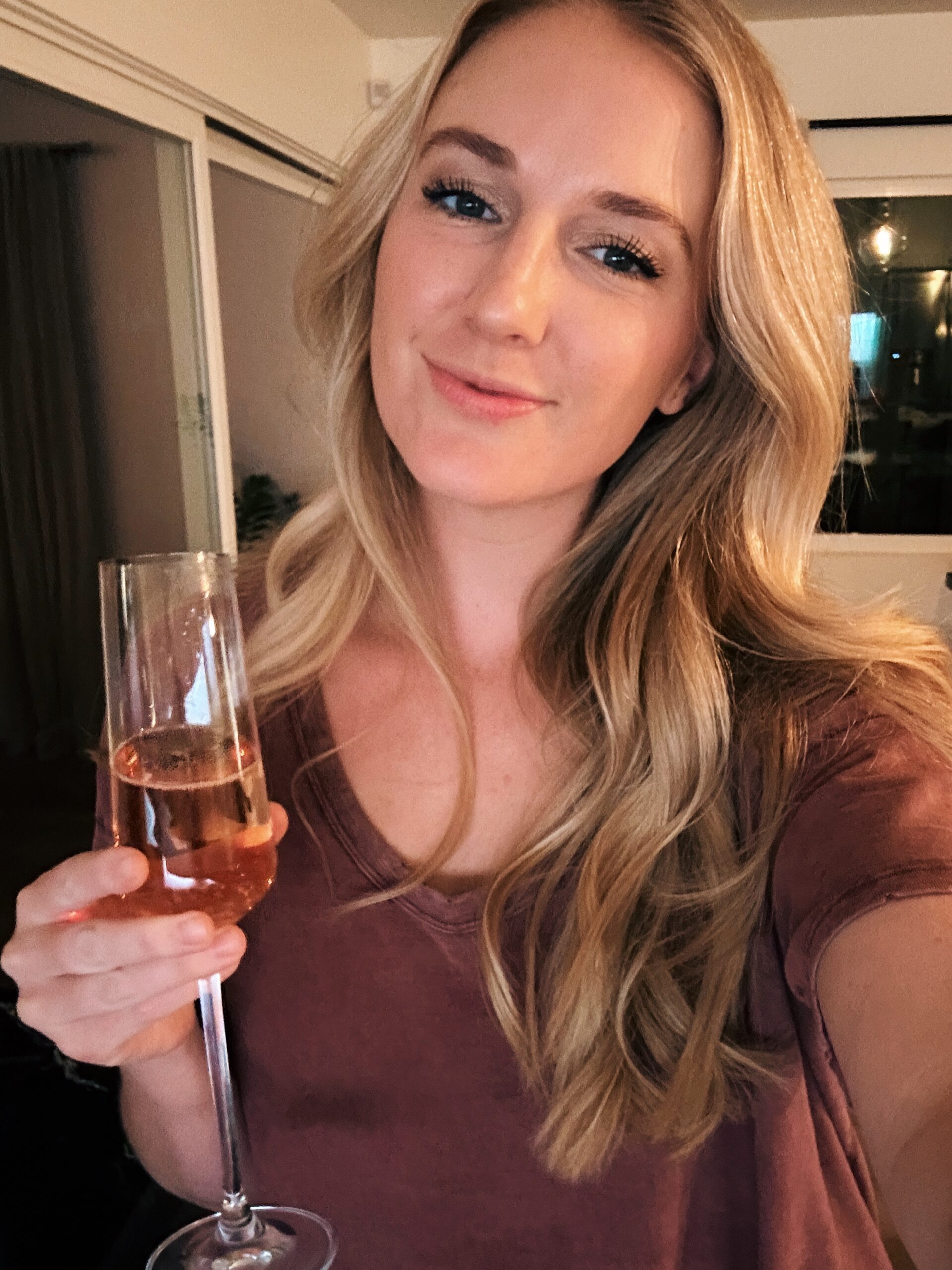 picture of a woman holding a champagne glass