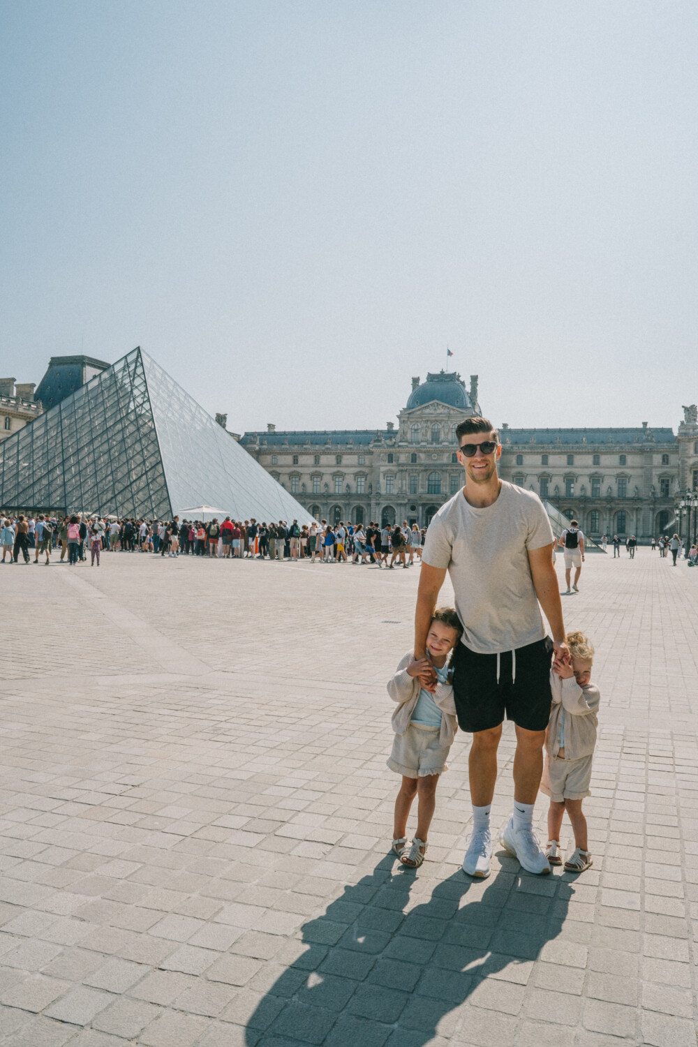 dad with kids sharing Things to Do in Paris with Kids 