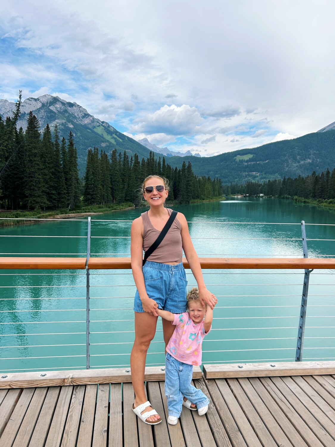 Ruth Nuss smiling with her kid during a Banff Family Travel