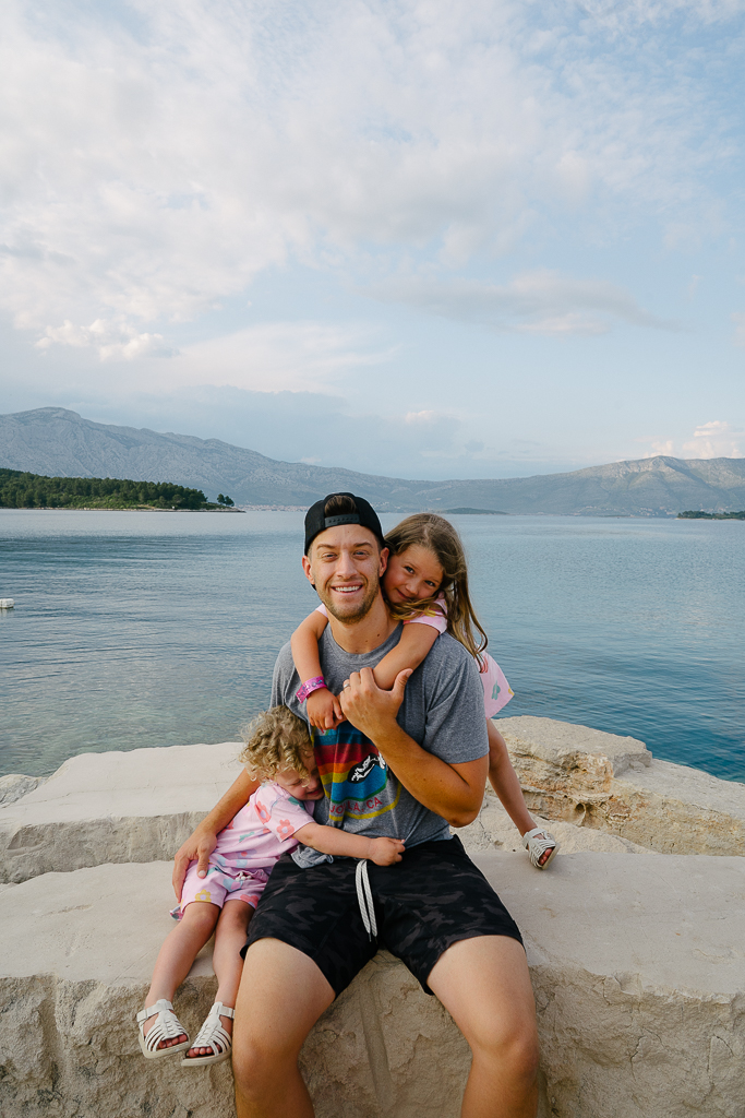 father with her two daughters sharing their Korcula Croatia Travel Guide