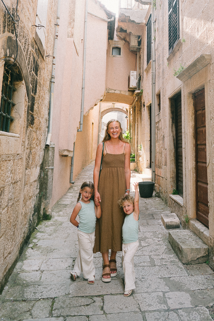 woman with her two kids sharing their Korcula Croatia Travel Guide