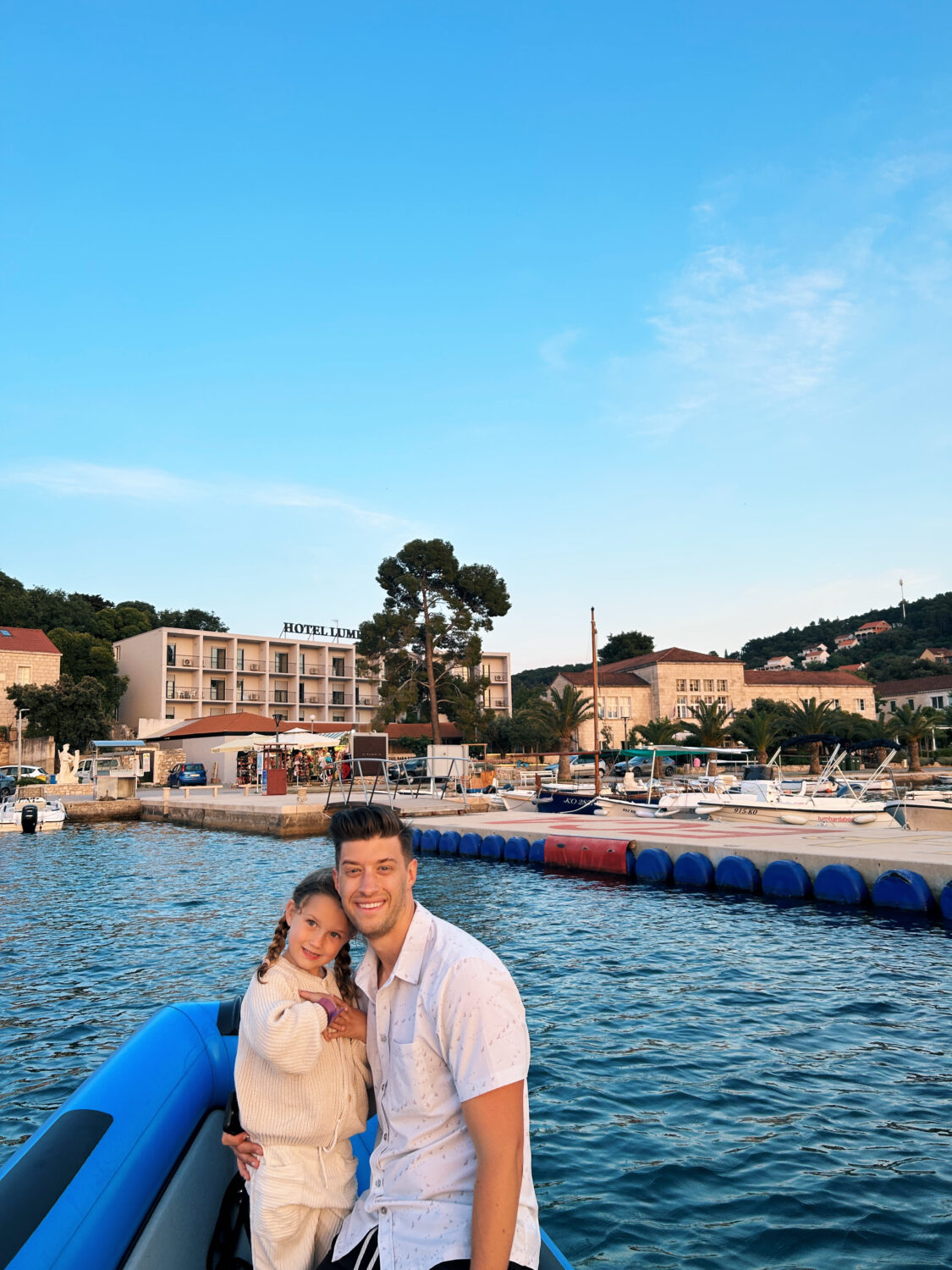 father and daughter in a boat sharing Korcula Croatia Travel Guide