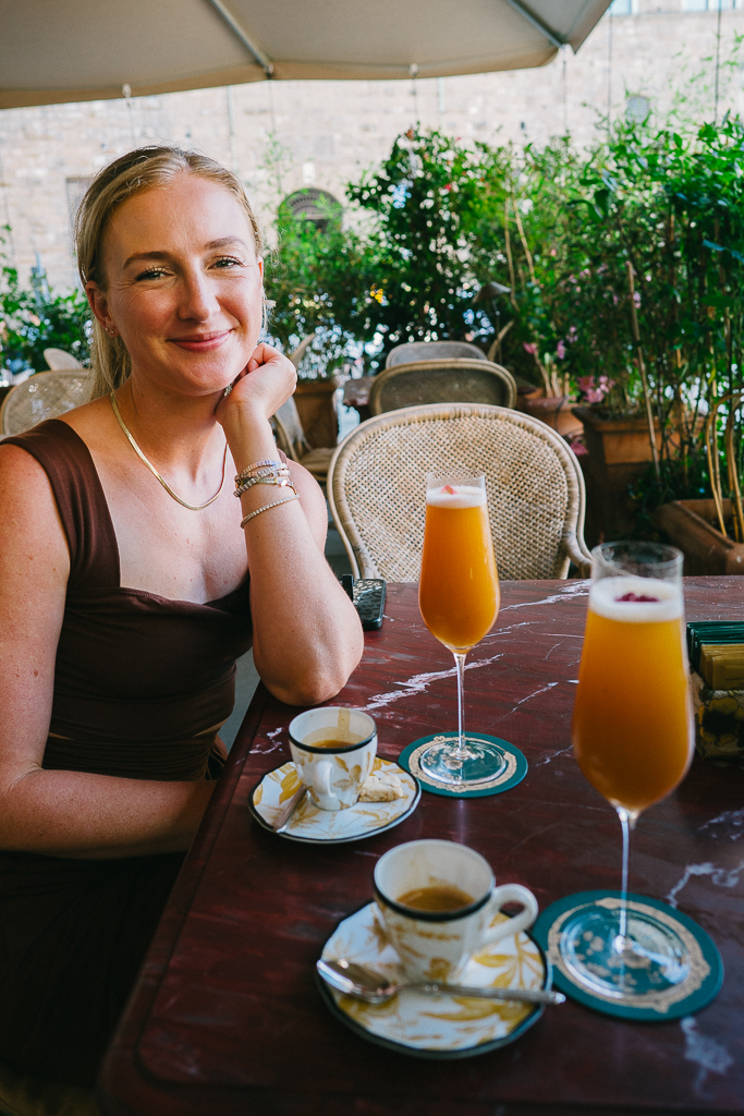 Ruth Nuss drinking at a cafe during their 1 Day Florence Itinerary