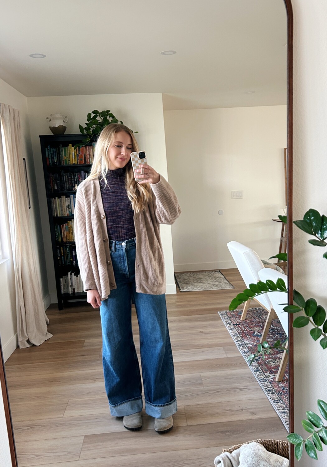Ruth Nuss styling her AGOLDE Dame Jeans with Turtleneck + cardigan + clogs