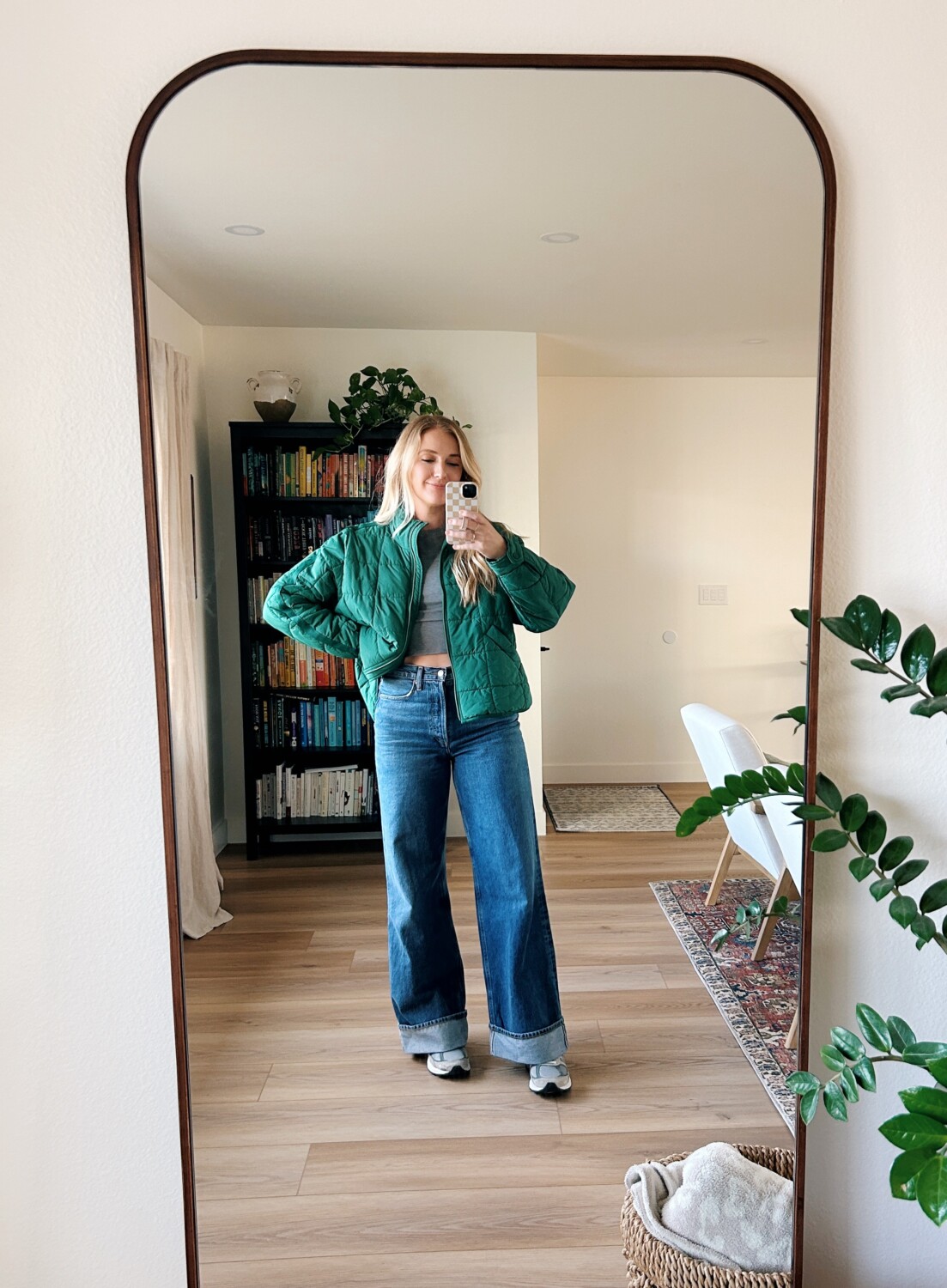 Ruth Nuss styling her AGOLDE Dame Jeans with Puffer jacket + t-shirt + New Balances