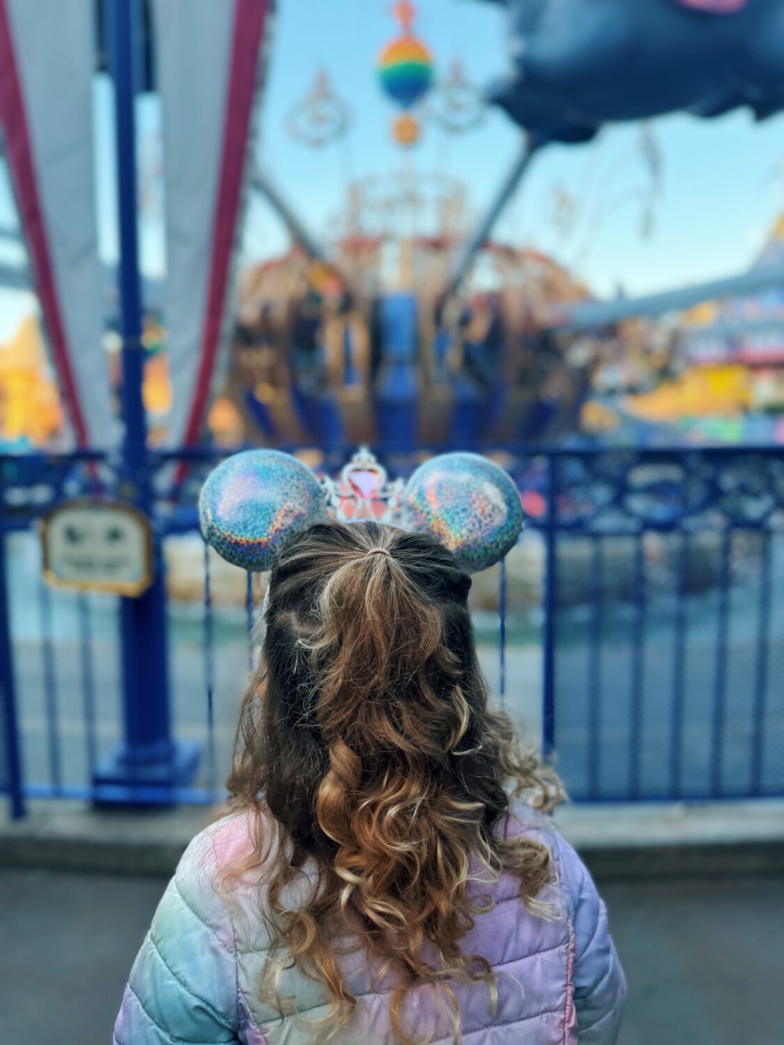 a girl in fantasyland at disneyland