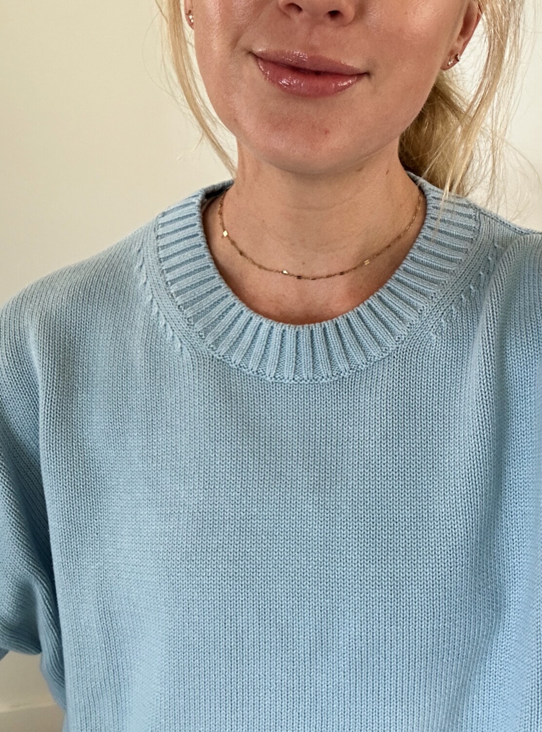 Ruth Nuss wearing a light blue sweater