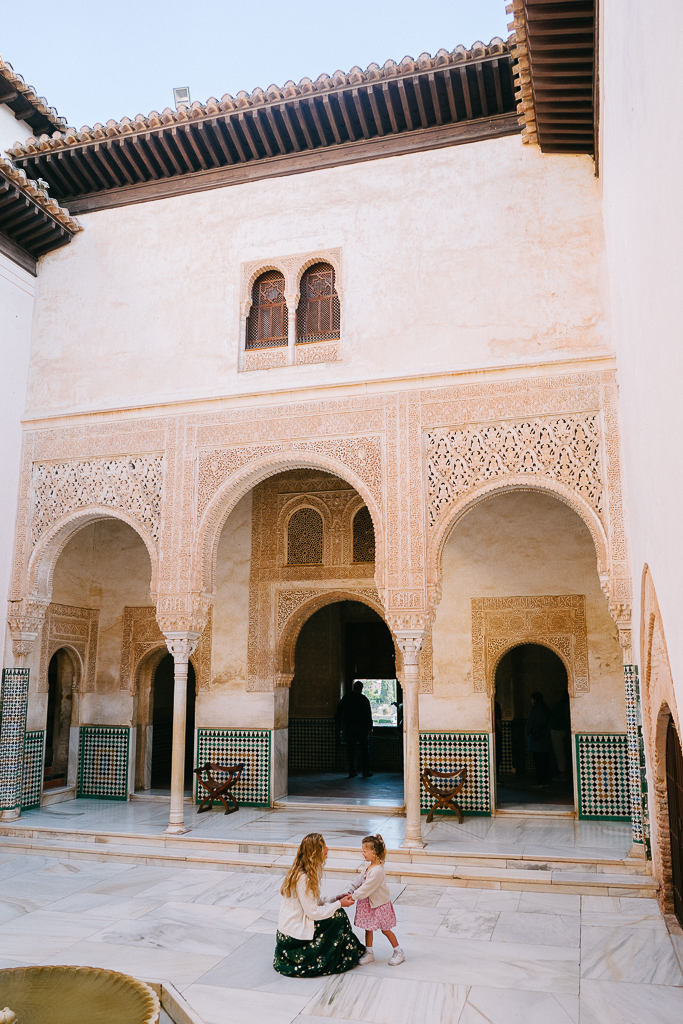 Ruth Nuss in the Alhambra in Granada for their 2 week Spain and Portugal itinerary with kids