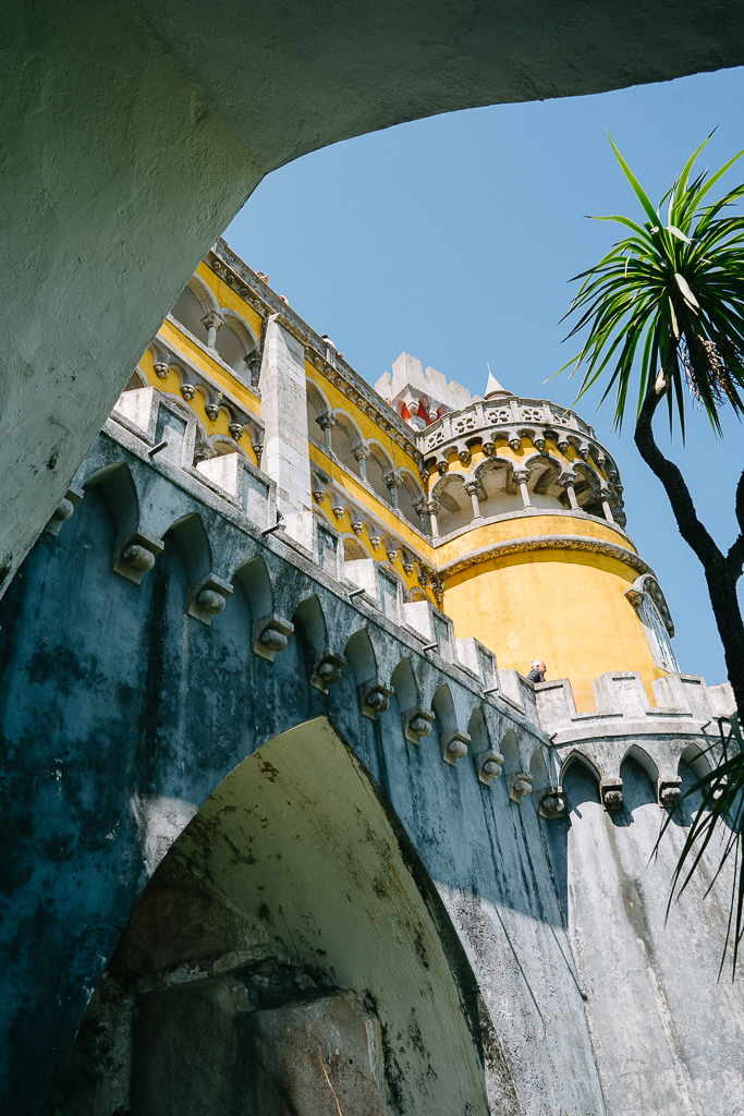 a yellow tower on pena palace in sintra 