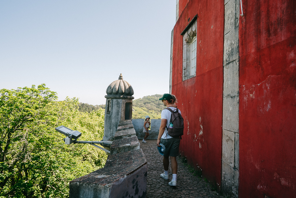 tyler nuss and his daughters at pena palace as part of their lisbon to sintra day trip