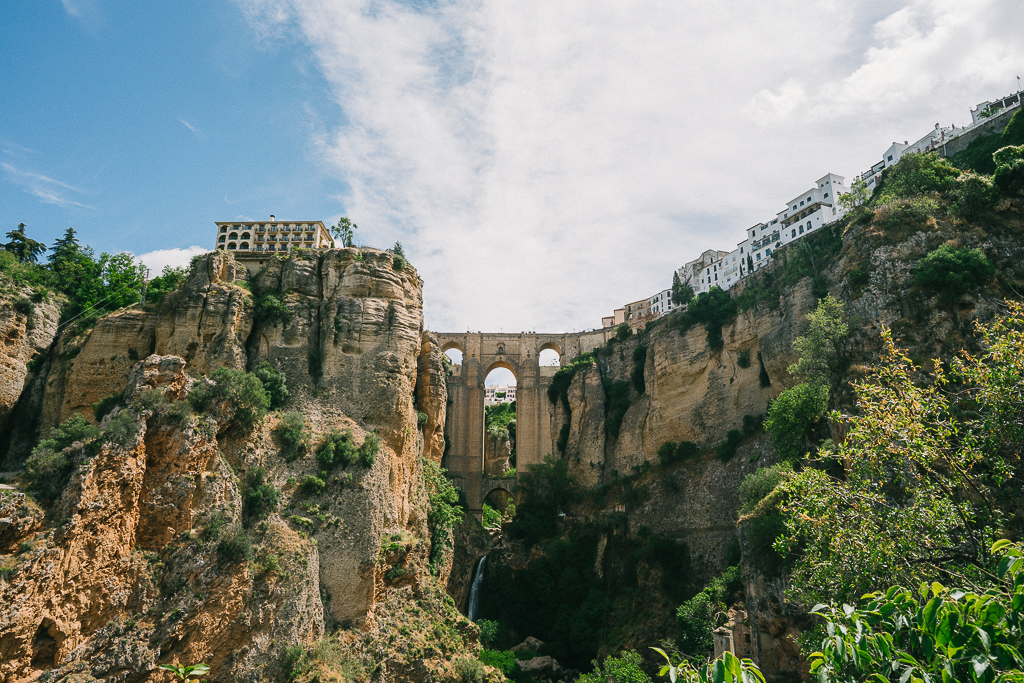 view of the puente nuevo bridge and waterfall in ronda