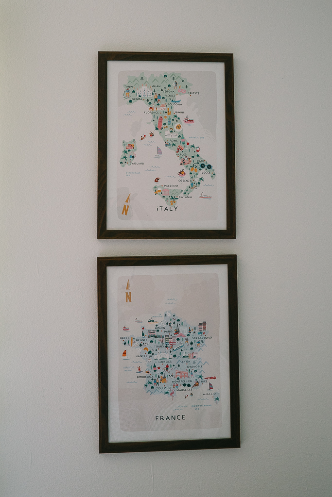 two art print maps of france and italy in walnut frames