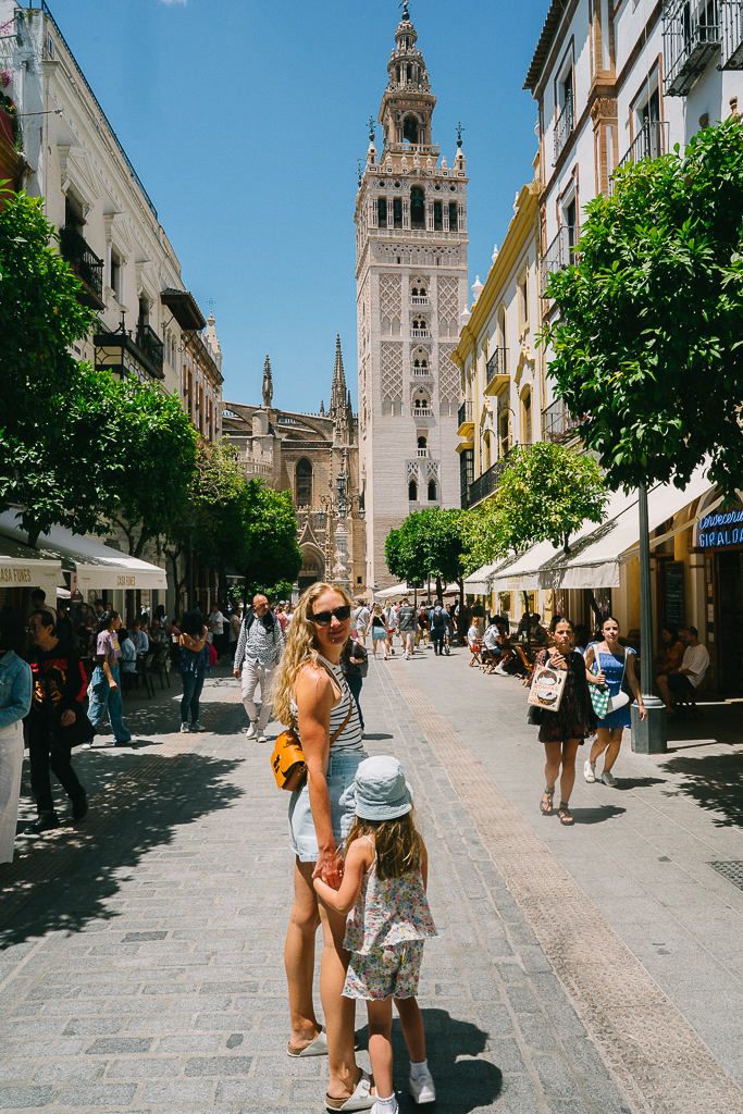 ruth nuss standing on a street in seville spain for her seville itinerary