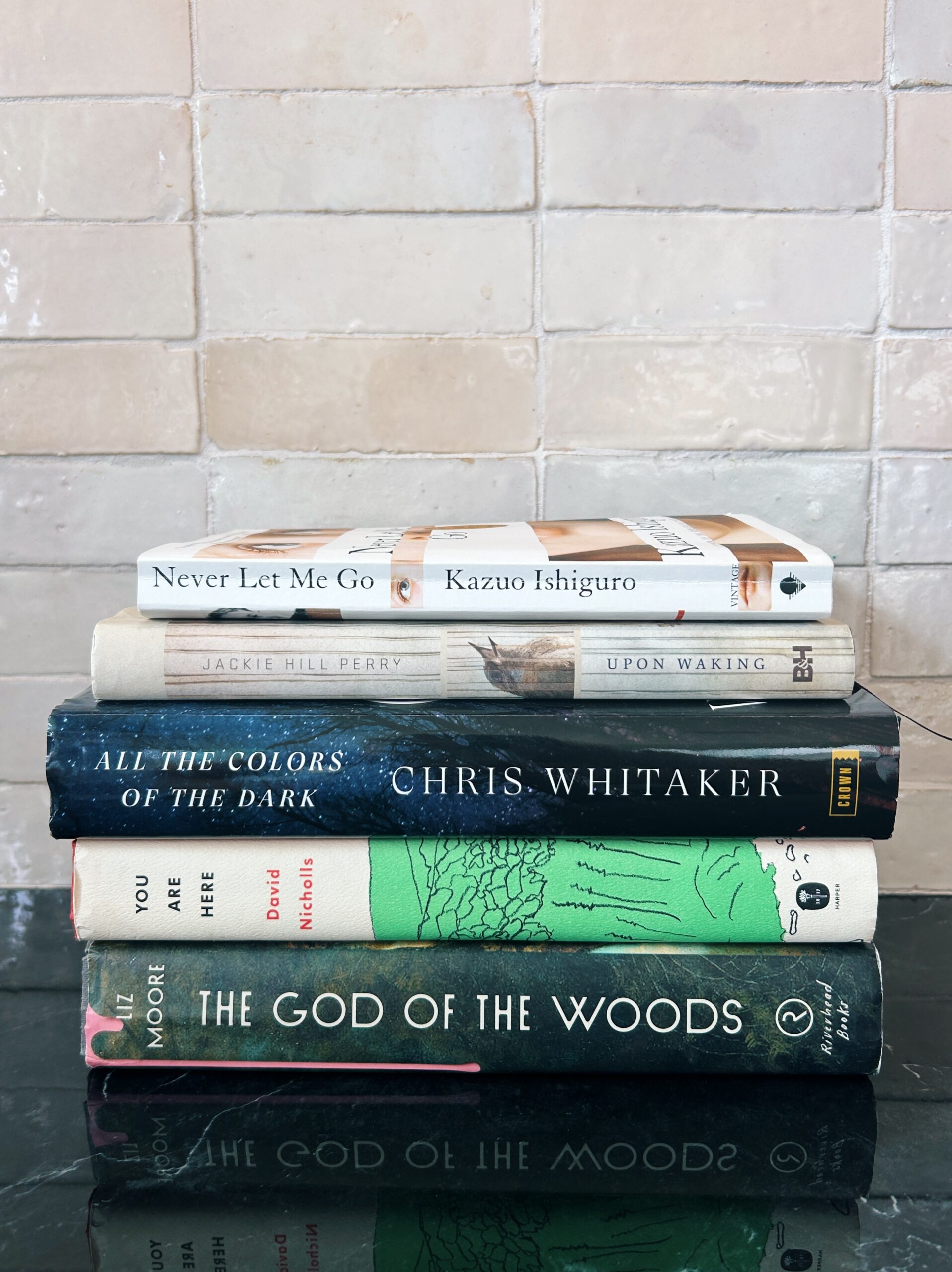 stack of books for a summer reading roundup