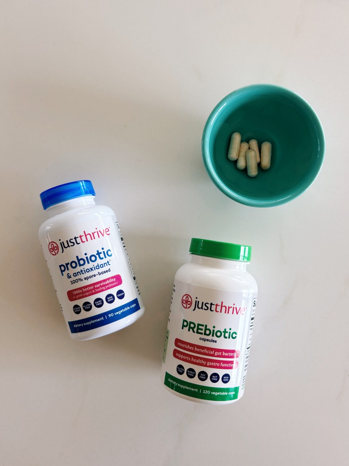 a bottle just thrive probiotic and prebiotic and a little bowl