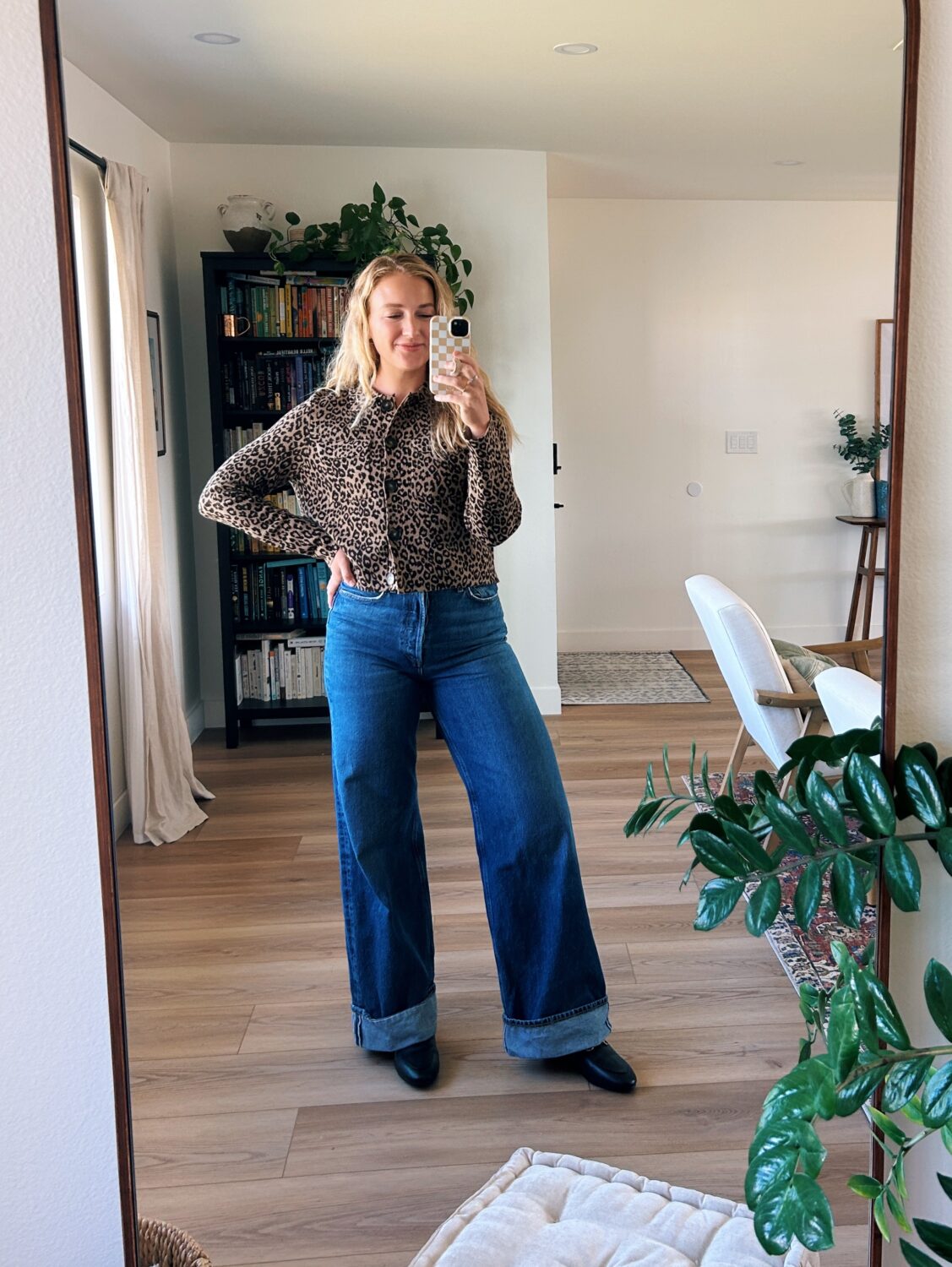 ruth nuss wearing the sézane betty cardigan and wide leg jeans