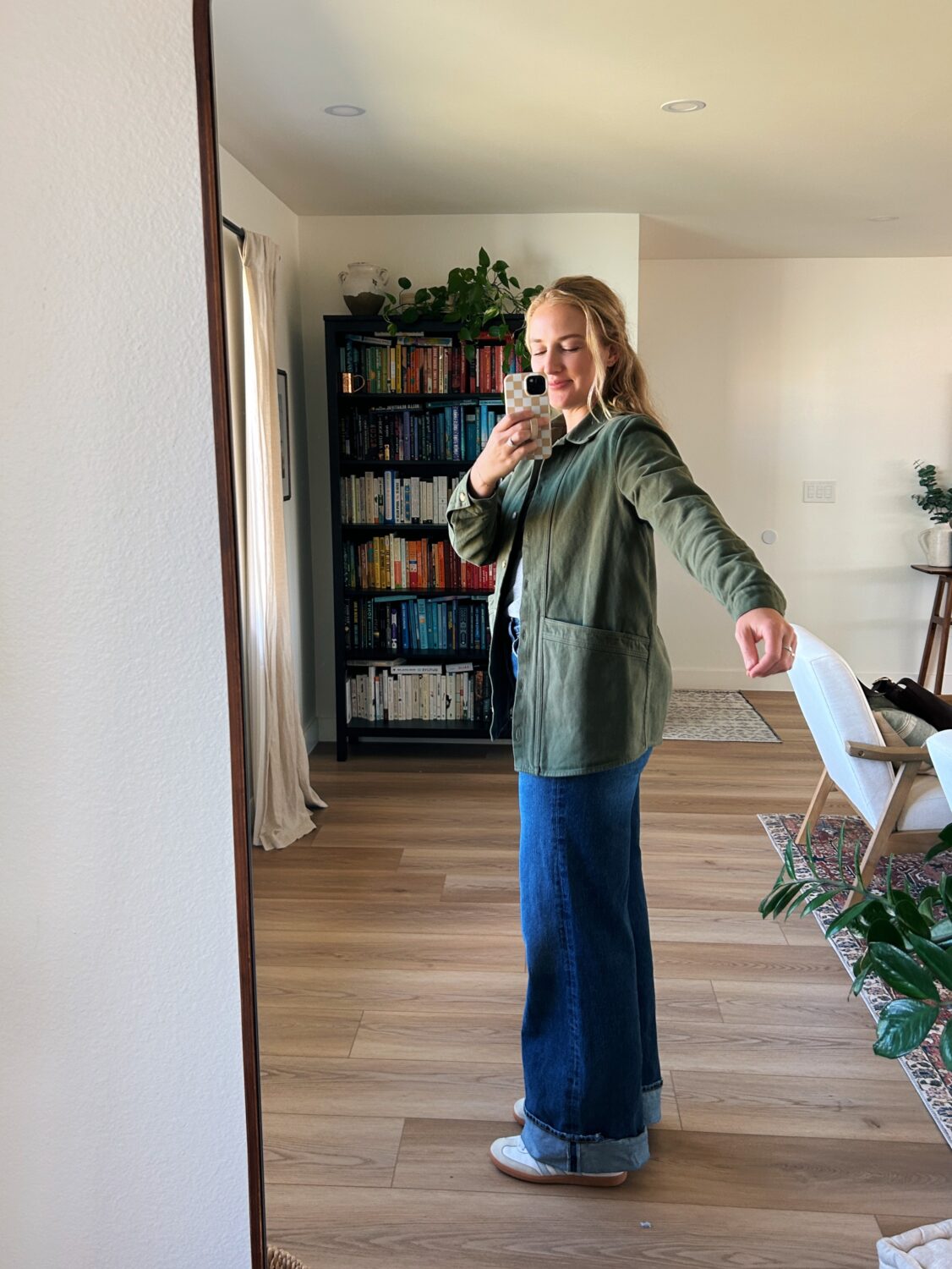 ruth nuss showing the fit of the sezane will jacket