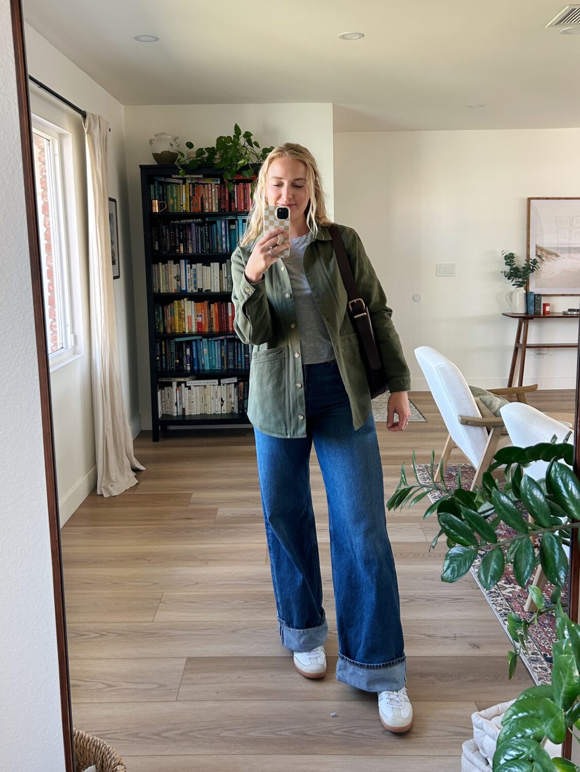 ruth nuss wearing jeans and a green sezane will jacket for her sézane will jacket review