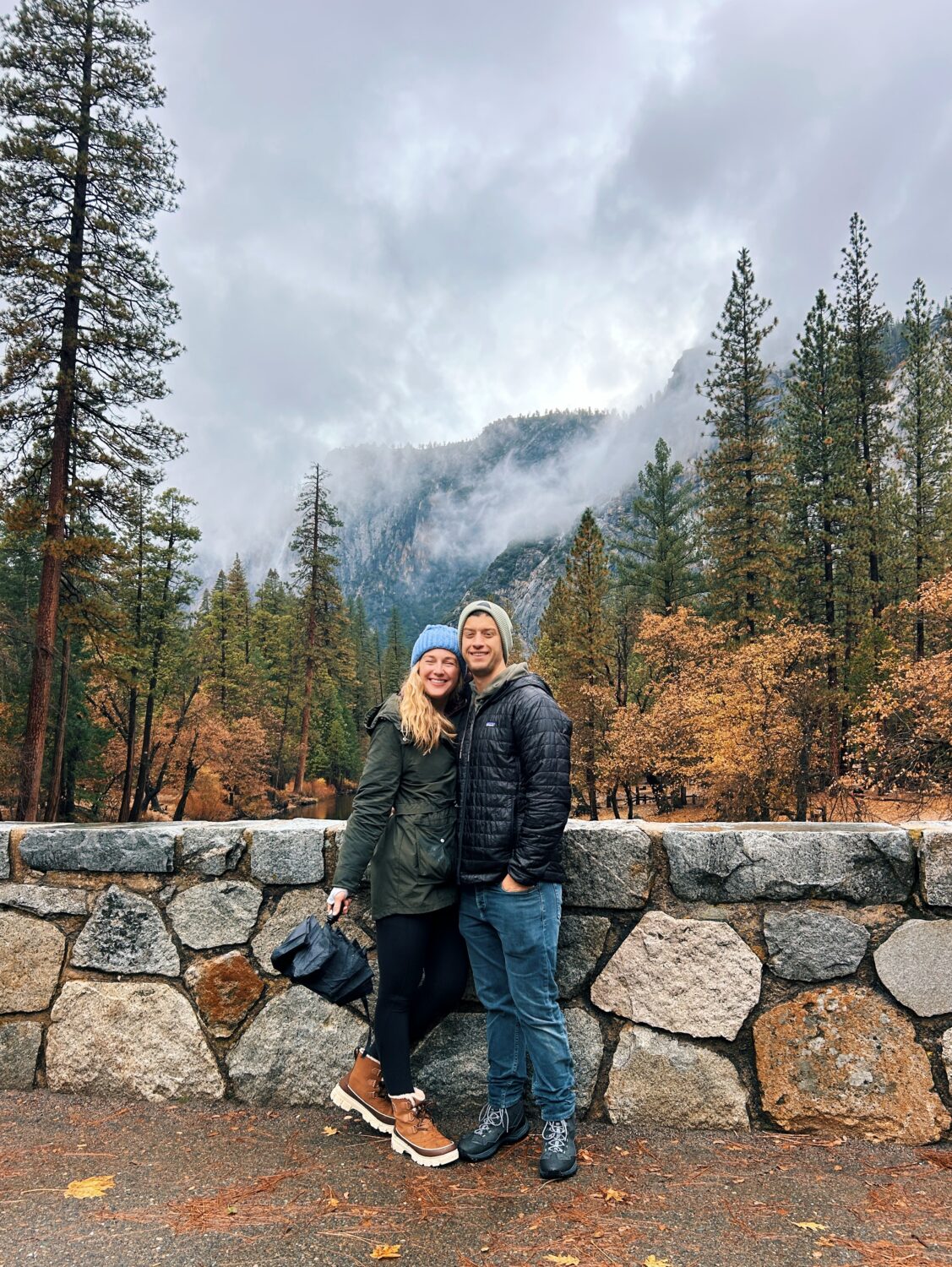 ruth and tyler nuss on a bridge in yosemite