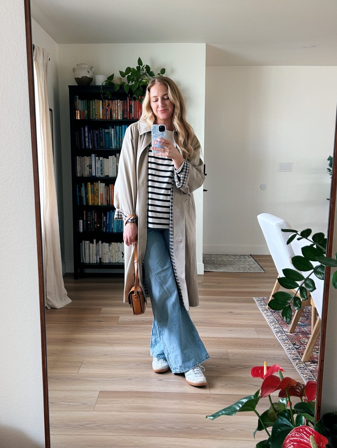 ruth nuss wearing the sezane clyde trench coat