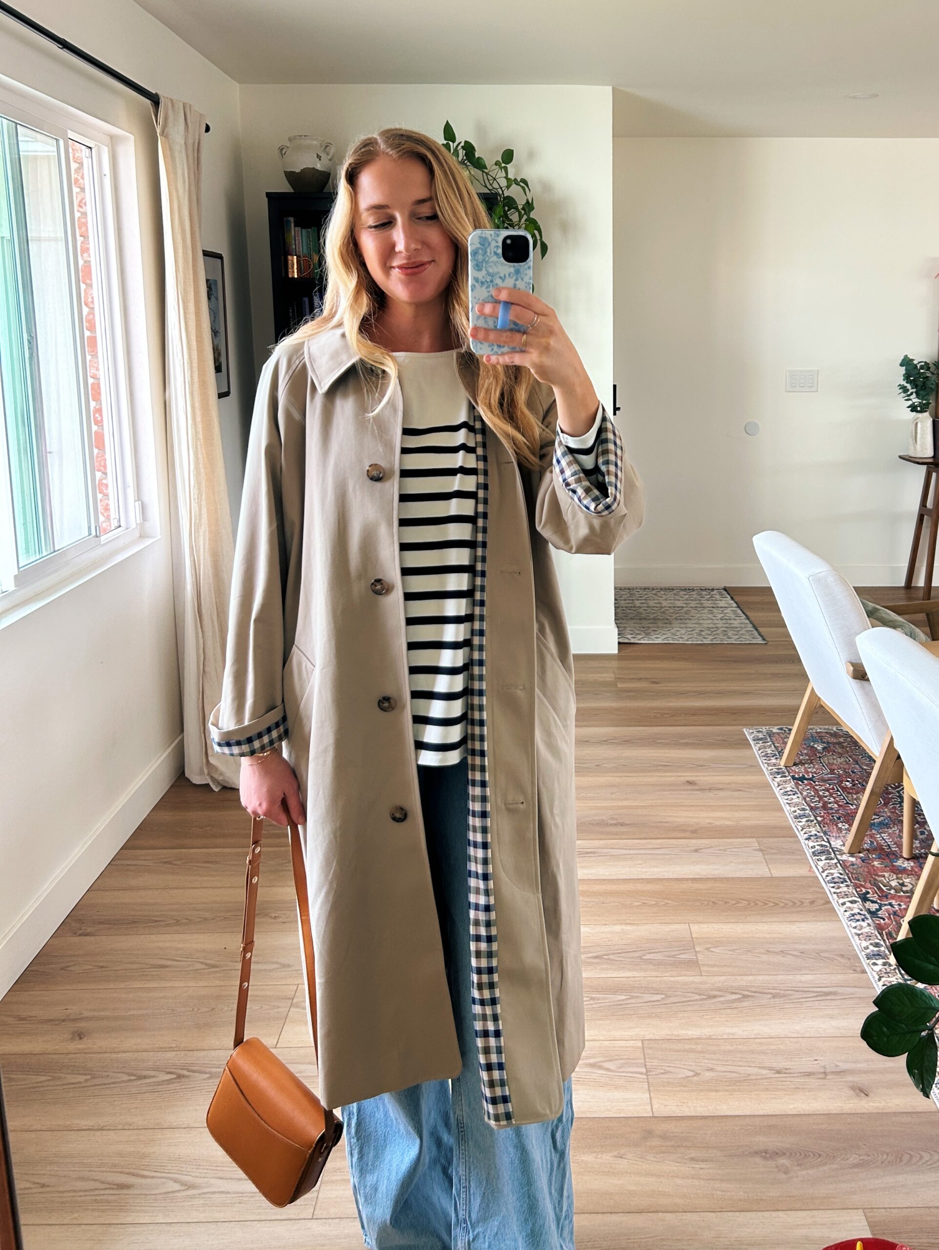 ruth nuss wearing the sezane clyde trench coat for her sezane clyde trench coat review