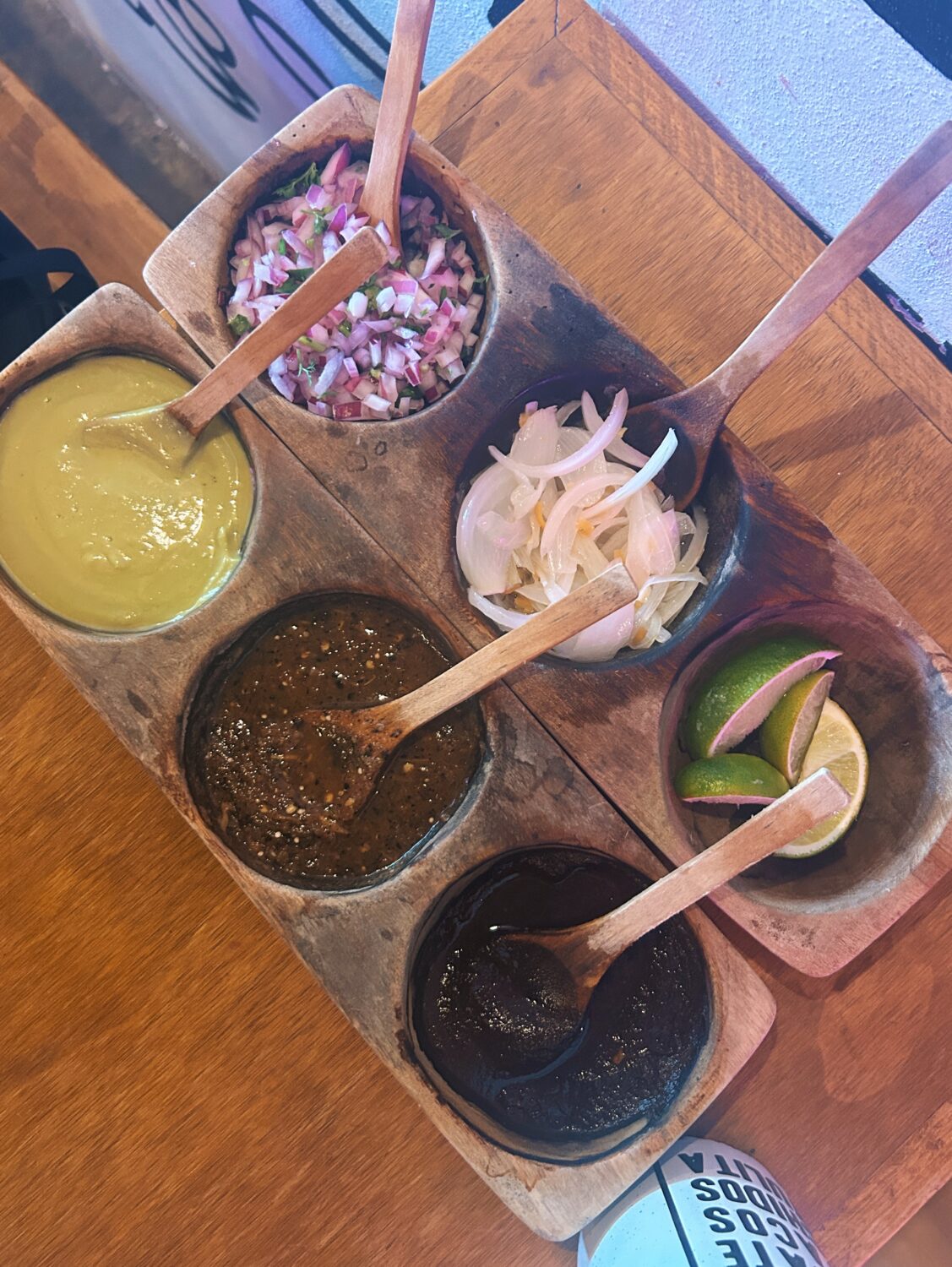 salsas and taco toppings at el itakate in sayulita 