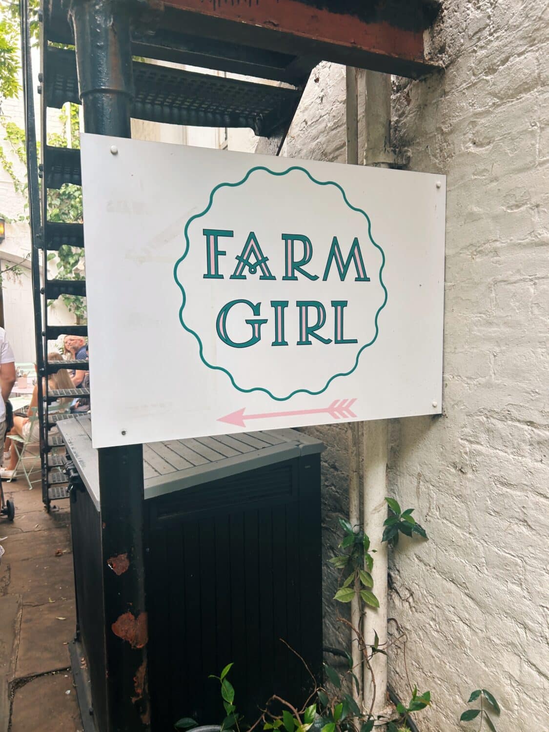 a farm girl cafe sign in notting hill london