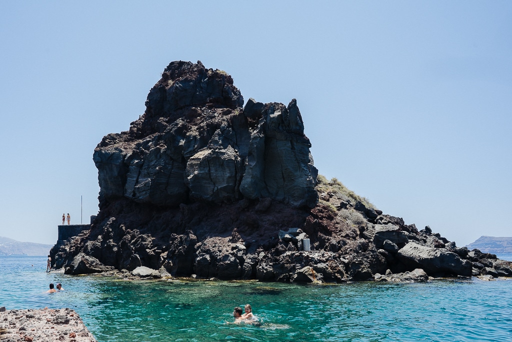 swimming spot in ammoudi bay in santorini greece