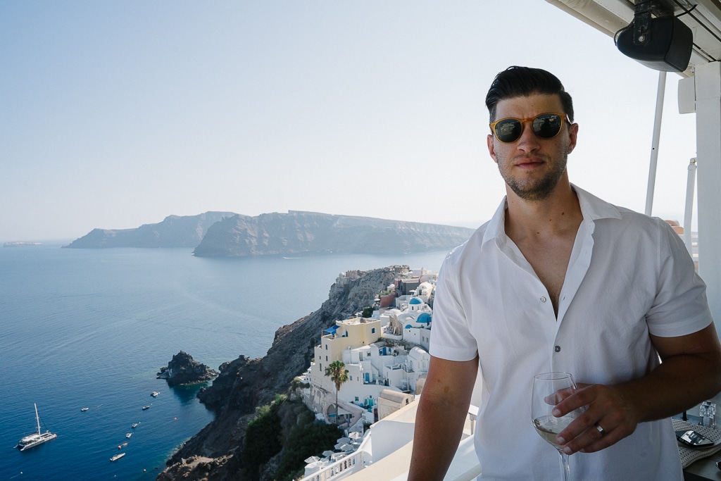 tyler nuss at a dinner with a view in santorini