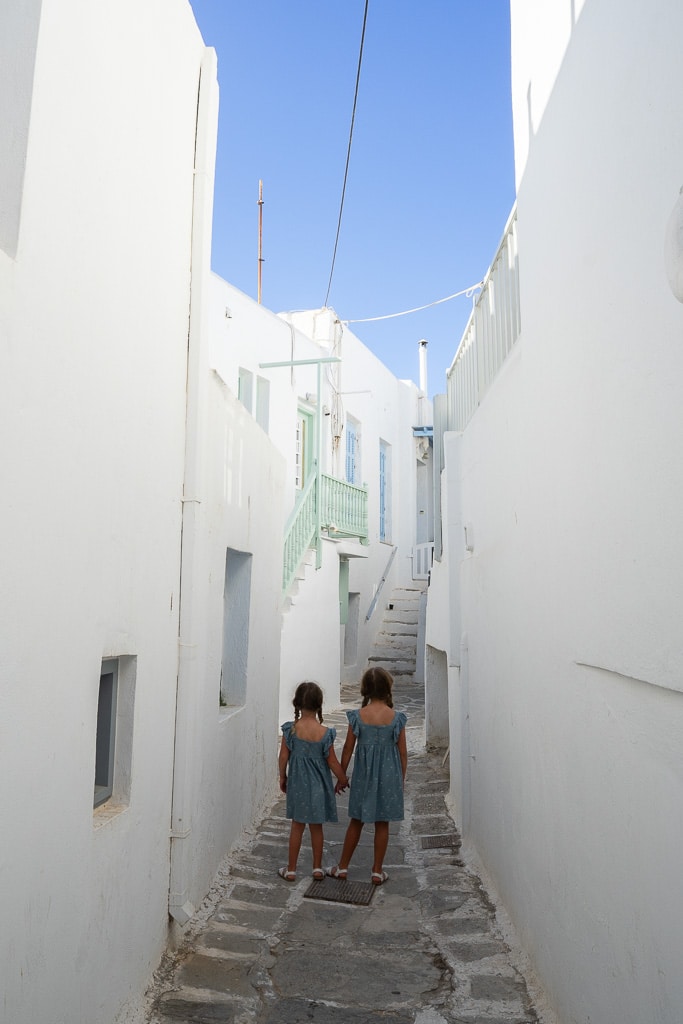two girls walking Naousa in paros greeec