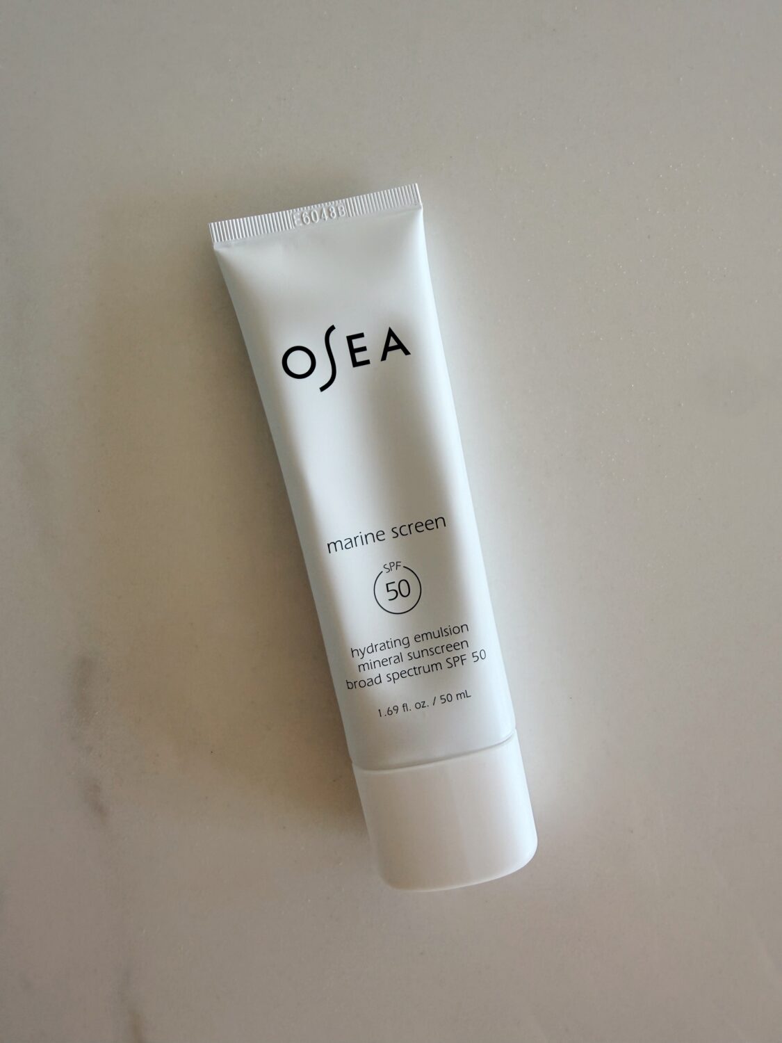 OSEA mineral SPF review. a bottle of OSEA's SPF