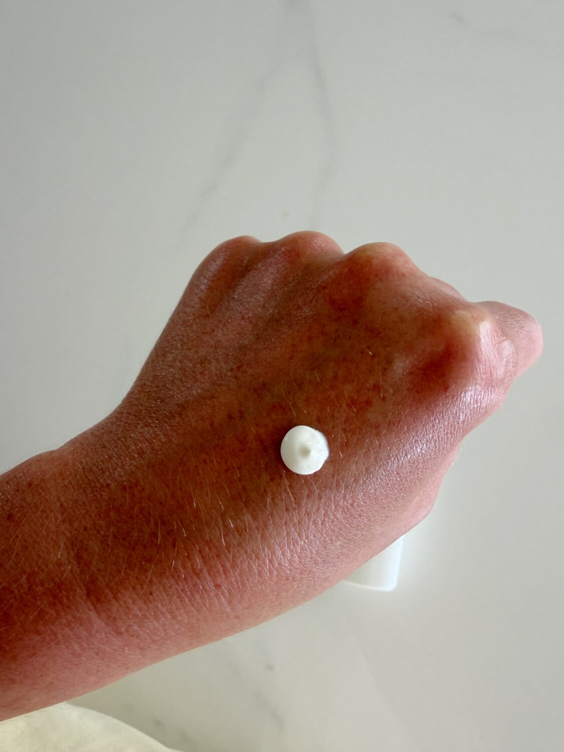 a pea sized amount of OSEA's mineral SPF 50