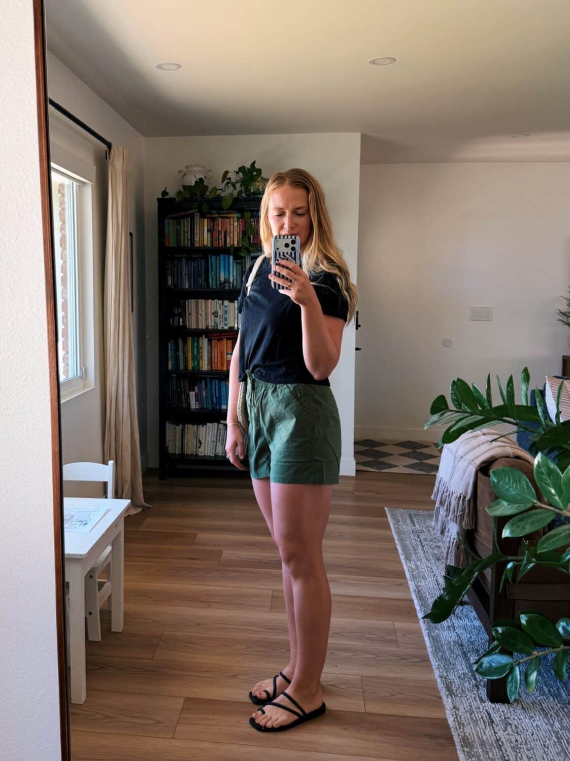 ruth nuss wearing title nine's scout shorts for her title nine hiking shorts review