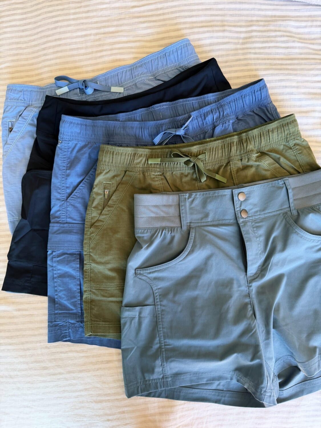 a stack of 5 of title nine's bestselling hiking shorts for a title nine hiking shorts reviews